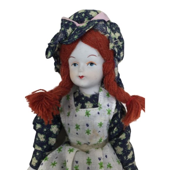 Vintage Porcelain Collectible Doll Wearing Floral Printed Dress With Red Braided - Picture 4 of 4